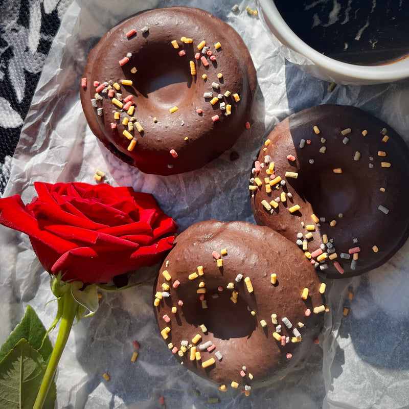 Chocolate Doughnuts With Ganache And Sprinkles